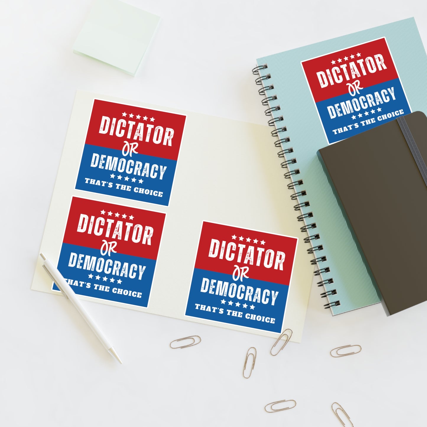 dictator or democracy sticker on notebook